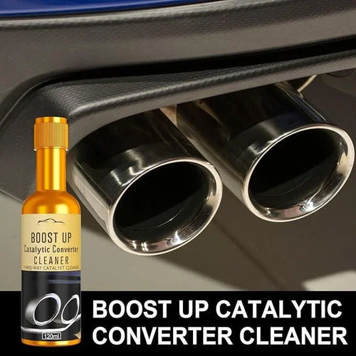 Boost Up Catalytic Converter Cleaner bottle in front of car exhaust pipes